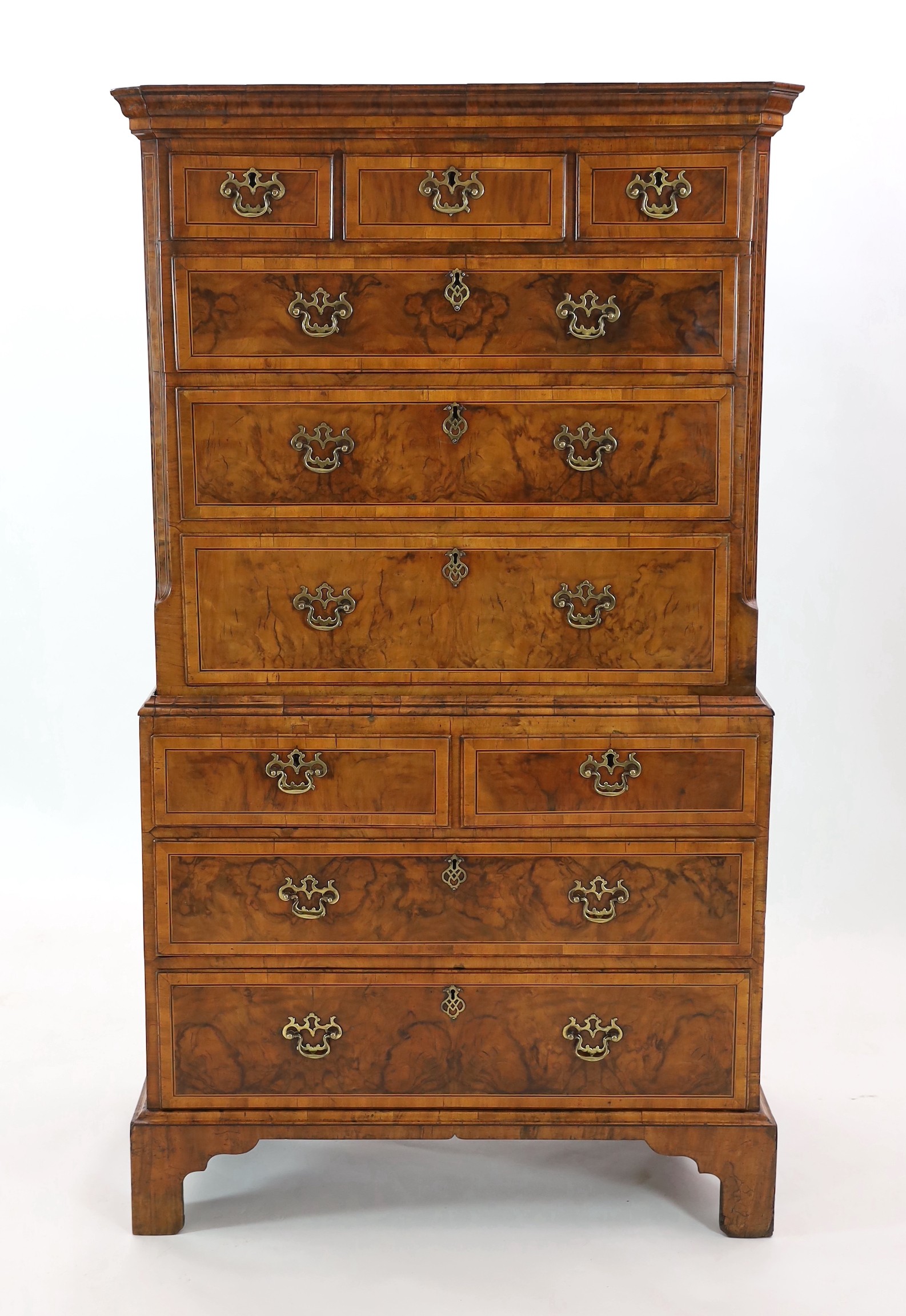 A George I inlaid walnut chest on chest, width 101cm, depth 58cm, height 176cm